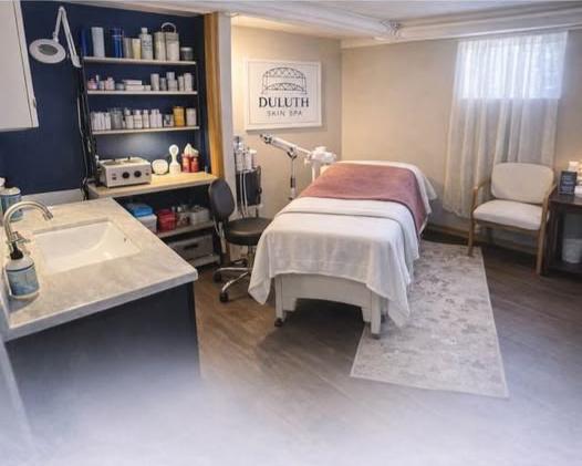 Private treatment room at Duluth Skin Spa with treatment table and soft natural light